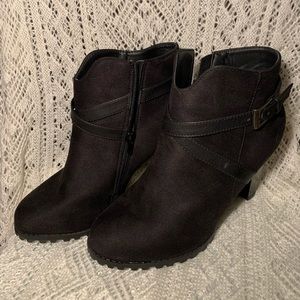 Black ankle heeled booties.